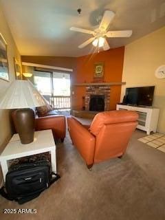 living room featuring a ceiling fan, lofted ceiling, a fireplace, and carpet floors