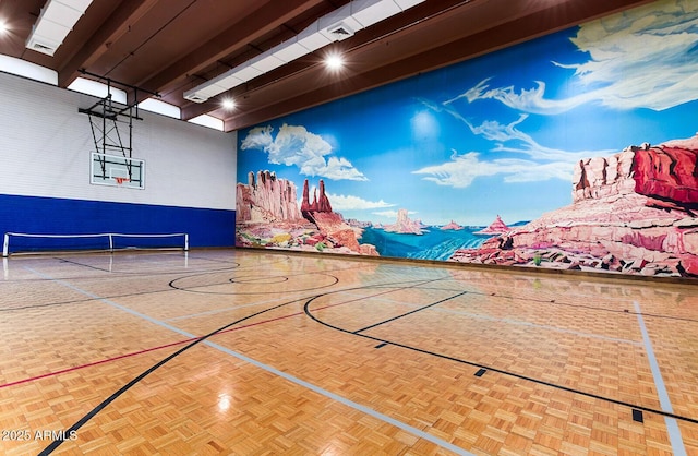 view of sport court featuring a tennis court and community basketball court