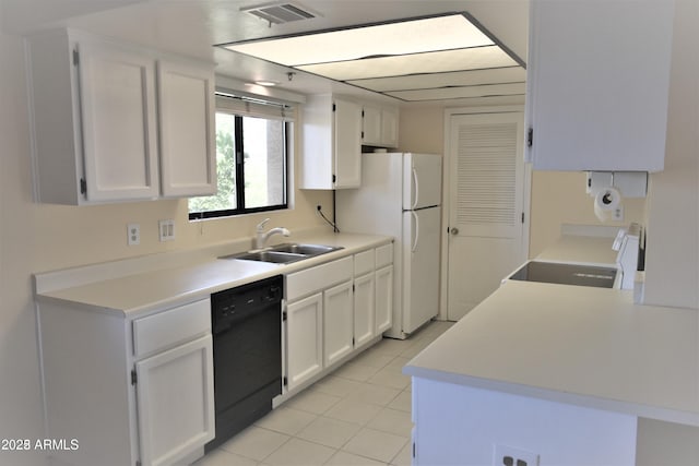 kitchen featuring visible vents, white cabinets, a sink, range, and dishwasher