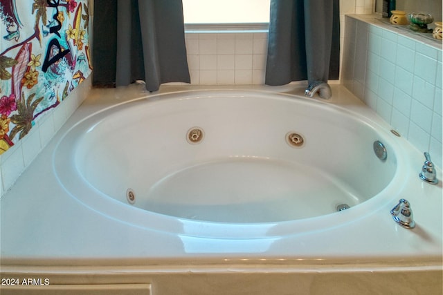 bathroom with a washtub