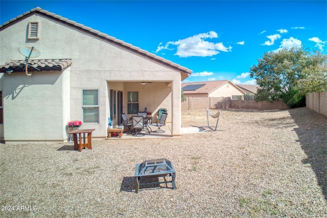 back of house featuring a patio area