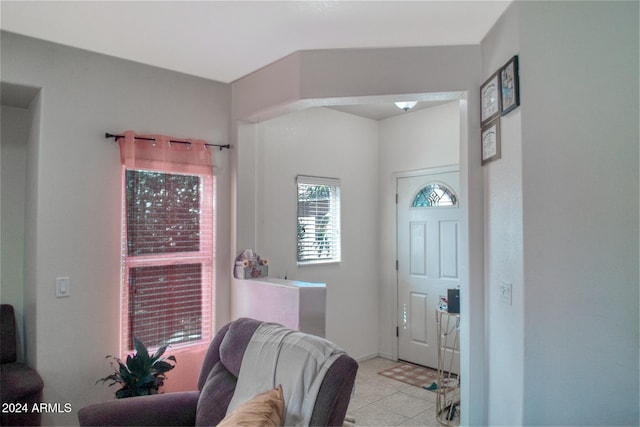 entryway featuring light tile patterned floors