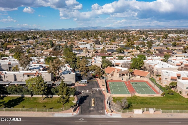 birds eye view of property featuring a mountain view