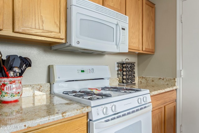 kitchen featuring white appliances