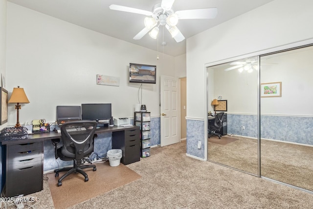 office space with ceiling fan, carpet floors, and vaulted ceiling