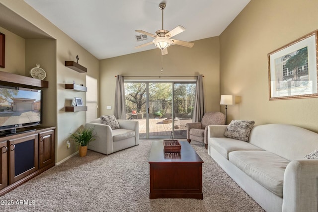 living room featuring light colored carpet, ceiling fan, and lofted ceiling