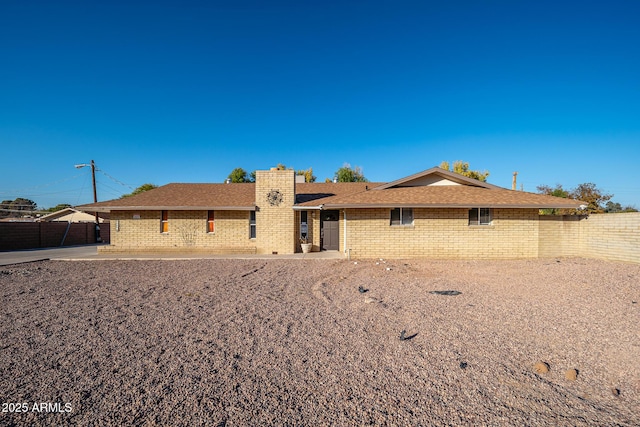 ranch-style home with a patio area