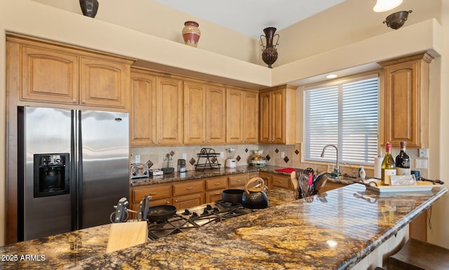 28309 N 156th Way, Scottsdale, AZ 85262 - kitchen featuring stainless steel refrigerator with ice dispenser, dark stone counters, and tasteful backsplash