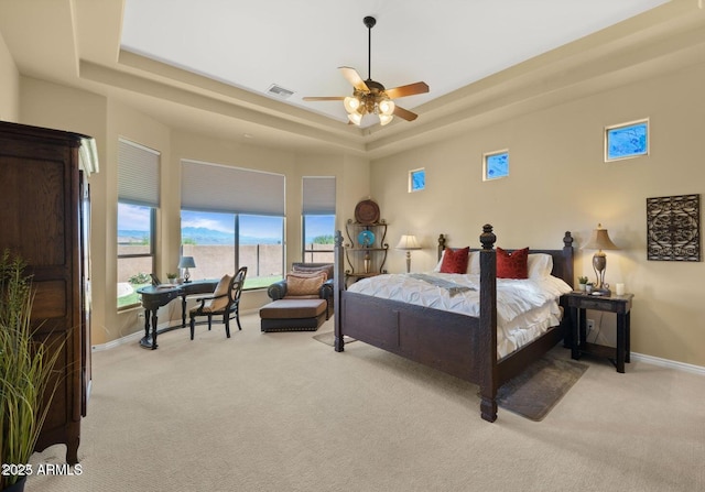 28309 N 156th Way, Scottsdale, AZ 85262 - carpeted bedroom featuring a tray ceiling, baseboards, and a ceiling fan
