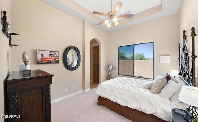 28309 N 156th Way, Scottsdale, AZ 85262 - carpeted bedroom featuring arched walkways, baseboards, and a ceiling fan