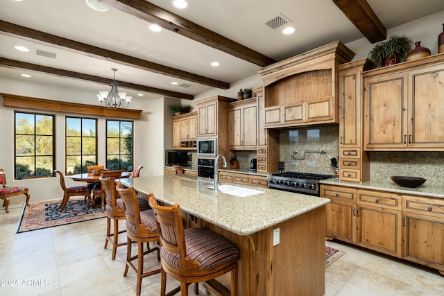 kitchen with sink, beam ceiling, a kitchen island with sink, backsplash, and built in microwave