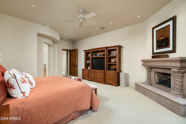 carpeted bedroom featuring ceiling fan