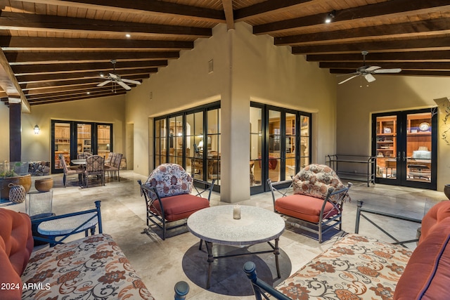 view of patio / terrace featuring an outdoor living space, ceiling fan, and french doors