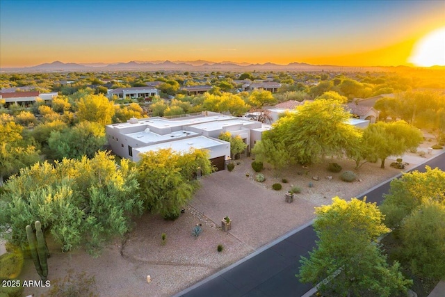 birds eye view of property featuring a mountain view and a residential view