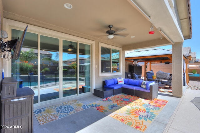 view of patio with a gazebo, ceiling fan, and an outdoor hangout area