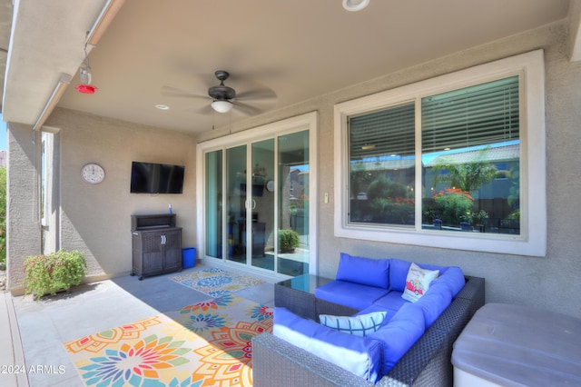 view of patio featuring ceiling fan and an outdoor hangout area