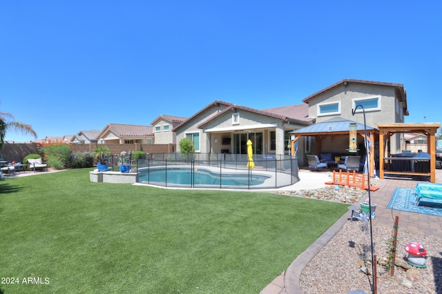 view of swimming pool with a lawn, an outdoor living space, a patio, and a gazebo