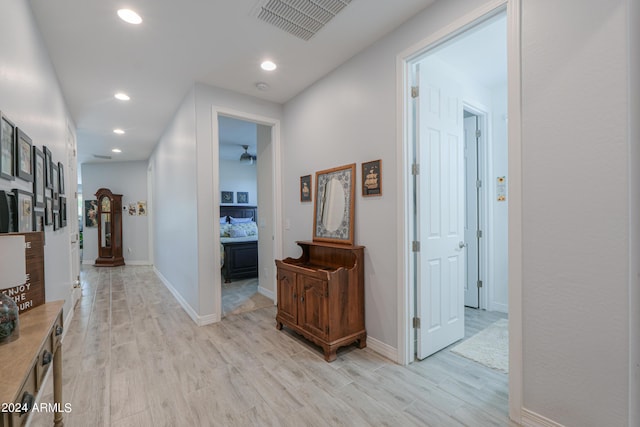 hallway featuring light hardwood / wood-style floors