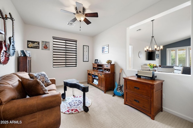 living area featuring baseboards, visible vents, ceiling fan with notable chandelier, and light carpet