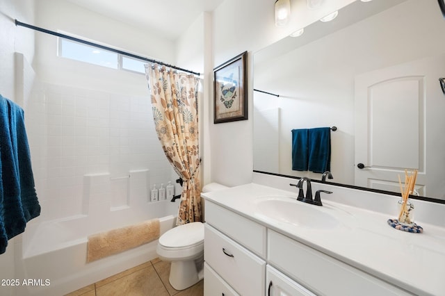 bathroom with toilet, tile patterned floors, shower / tub combo, and vanity