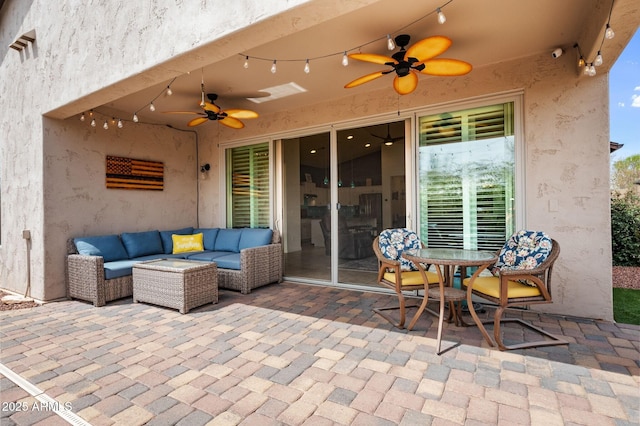 view of patio / terrace with outdoor lounge area and a ceiling fan