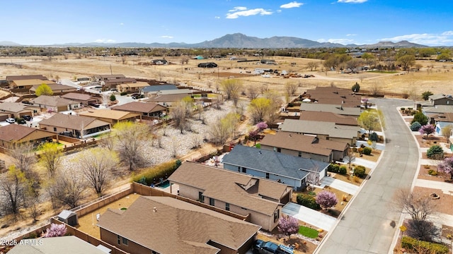 birds eye view of property with a residential view and a mountain view