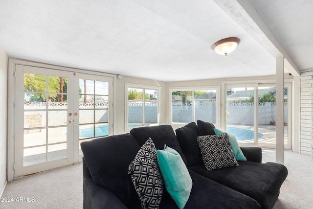 sunroom featuring french doors