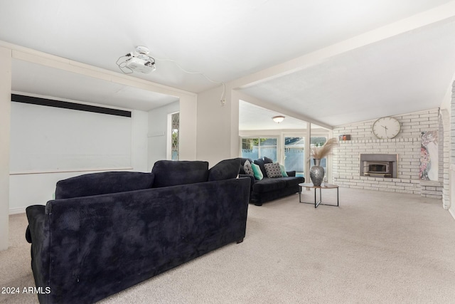 carpeted living room featuring vaulted ceiling and a wood stove