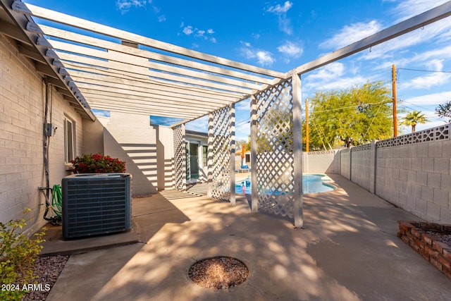 view of patio / terrace featuring a pergola, a fenced in pool, and cooling unit