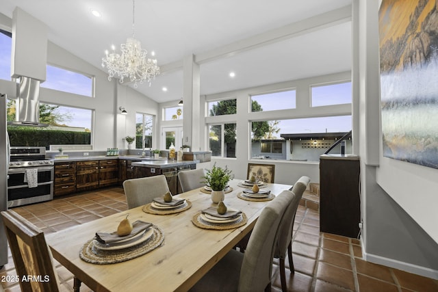 dining area featuring dark tile patterned flooring, a chandelier, recessed lighting, and high vaulted ceiling