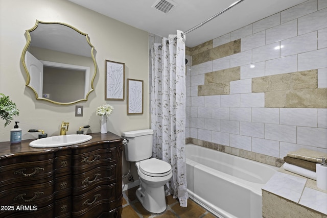 bathroom featuring toilet, shower / tub combo, and vanity