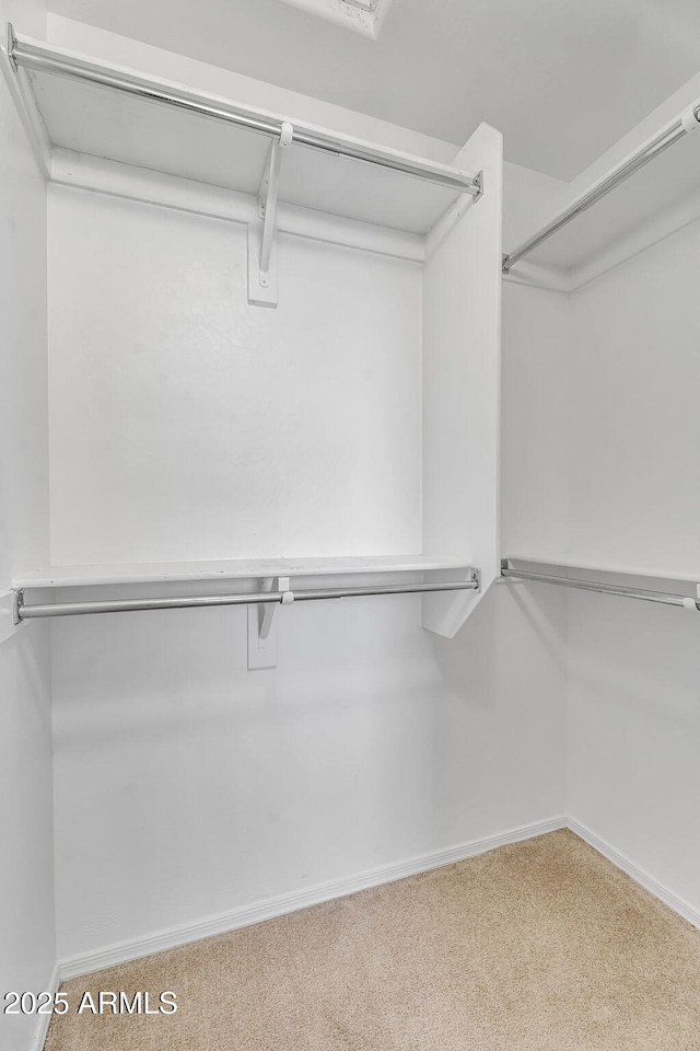 8071 W Georgetown Way, Florence, AZ 85132 - spacious closet featuring carpet floors
