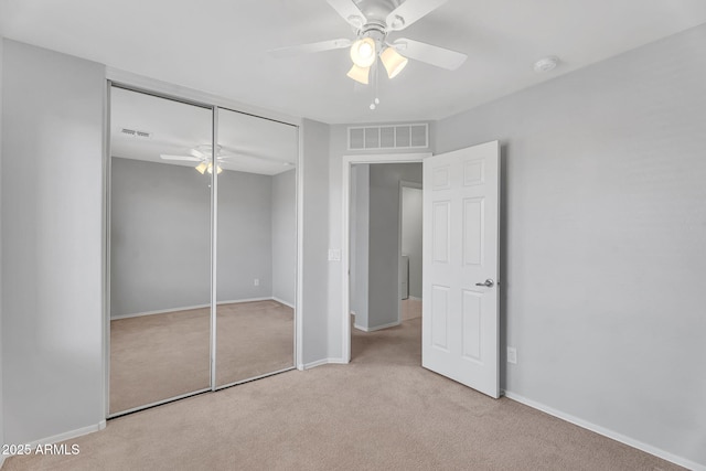 8071 W Georgetown Way, Florence, AZ 85132 - unfurnished bedroom with carpet, baseboards, a closet, and a ceiling fan