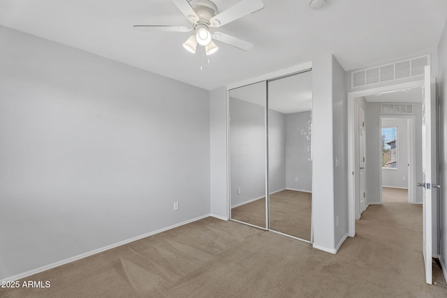 8071 W Georgetown Way, Florence, AZ 85132 - unfurnished bedroom with carpet, a closet, baseboards, and ceiling fan