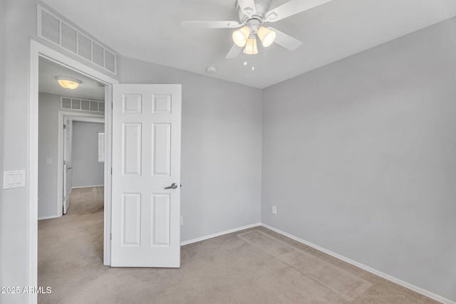 8071 W Georgetown Way, Florence, AZ 85132 - unfurnished bedroom featuring carpet floors, baseboards, and a ceiling fan