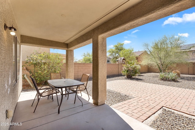 8071 W Georgetown Way, Florence, AZ 85132 - fenced backyard with a patio area and outdoor dining area