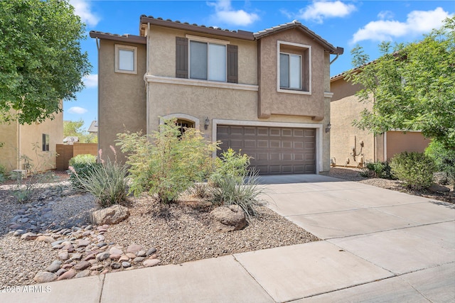 8071 W Georgetown Way, Florence, AZ 85132 - view of front facade with an attached garage, stucco siding, concrete driveway, and a tiled roof