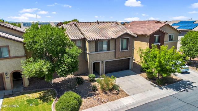 8071 W Georgetown Way, Florence, AZ 85132 - view of front of house featuring a garage, concrete driveway, a tiled roof, stucco siding, and a residential view