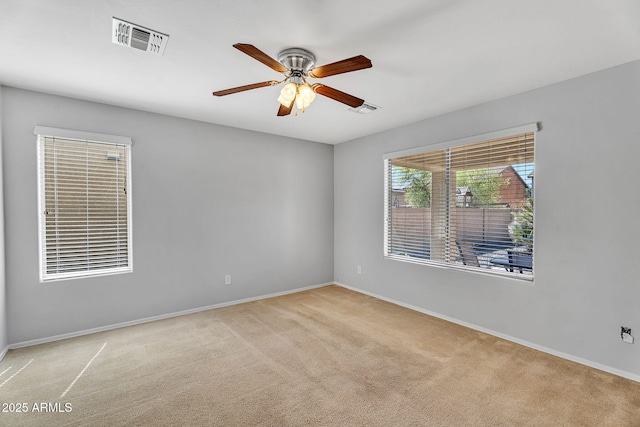 8071 W Georgetown Way, Florence, AZ 85132 - carpeted empty room featuring baseboards and a ceiling fan