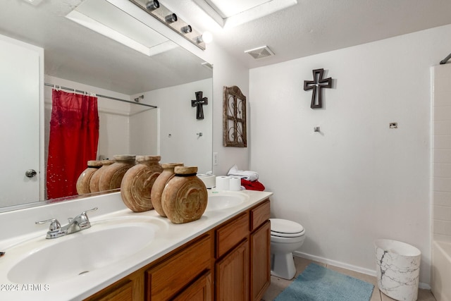 full bathroom with toilet, vanity, tile patterned floors, and shower / bathtub combination with curtain