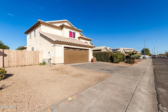 view of front of home featuring a garage