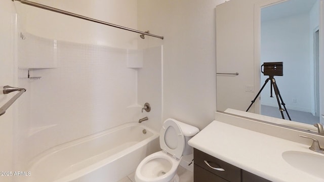 bathroom featuring vanity, toilet, and shower / bathtub combination