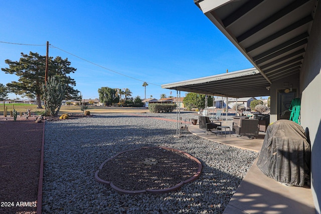 view of yard featuring a patio area