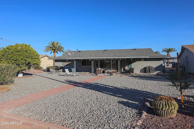 back of house featuring a patio