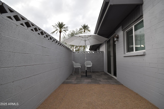 view of patio with fence