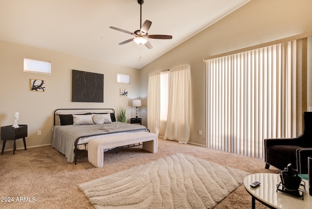 carpeted bedroom with high vaulted ceiling and ceiling fan