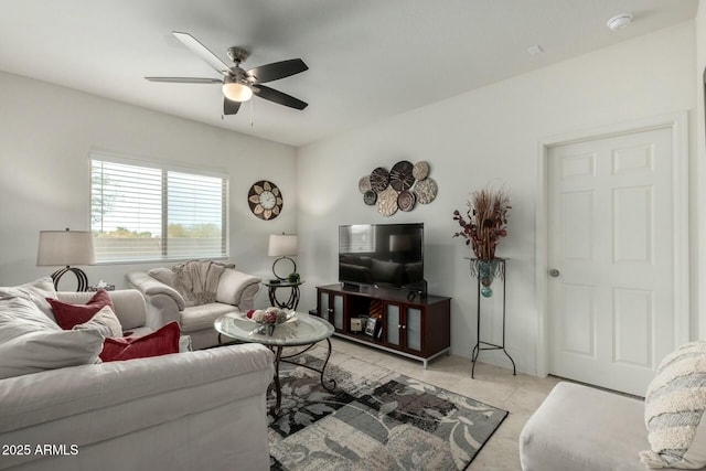 tiled living room featuring ceiling fan