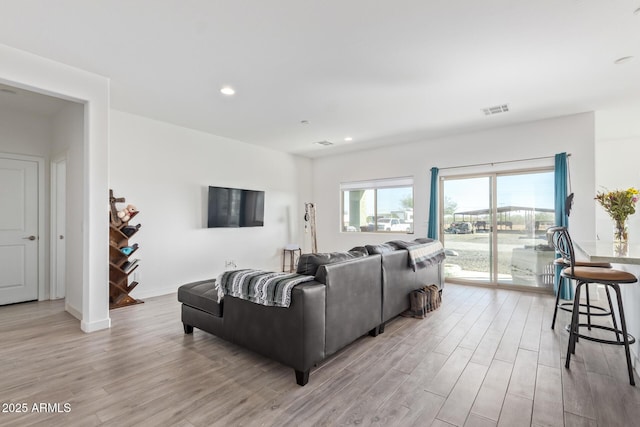 living room featuring light wood-type flooring