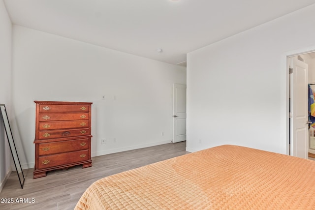 bedroom featuring light wood-type flooring