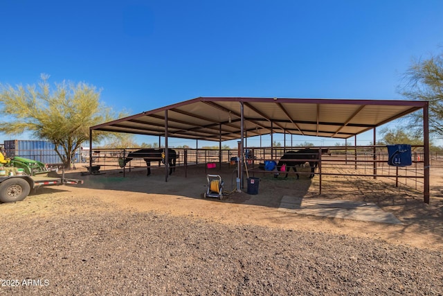 view of community with an outdoor structure